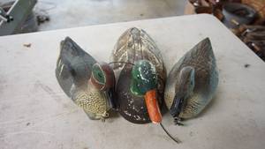 lot 119 image: Three vintage duck decoys one foam with movable head and two plastic
