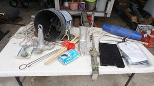 lot 128 image: Another lot of Assorted lakeboating items Including Anchors, buoys, clamps brackets etc.