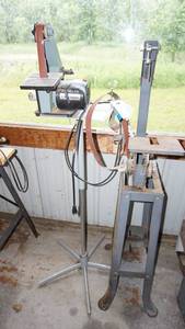 lot 144 image: Delta 1 inch belt sander on custom stand, belt sander stand accessory