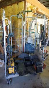 lot 157 image: OMGosh You gotta check this lot out Portable cage wheeled display rack for tools, wires, cables, hanging utility lights, DeWalt radio etc., DeWalt radio etc.