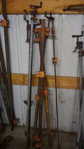 lot 174 image: Adjustable steel pole clamps
