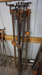 lot 177 image: Six 64 inch steel bar adjustable clamps