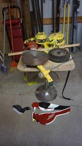 lot 179 image: Dairy Queen Style pedestal table, sawblade, caution tape rolls etc.