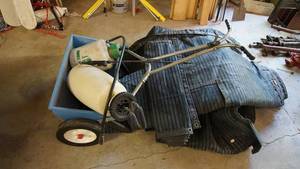lot 184 image: Red Devil fertilizer spreader, two chemical pesticide pumpssprayer, collapsible tarp house with tie-downs