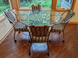 Glass Topped Dining Table with Rolling Chairs