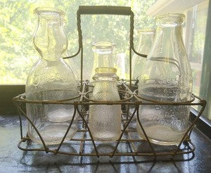 Old Milk Crate With Milk Bottles