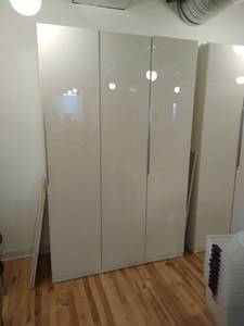 Two White Ikea Storage Cabinets