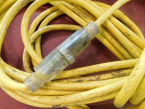 (2) 12-3 50 Extension Cord with lighted ends.