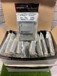 TWO BOXES OF PROTECTIVE ELECTRICAL COVERS