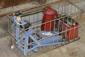 lot 15 image: Battery Charger, Jack, Jack Stands and Oil Can