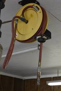 lot 65 image: retractable air hose