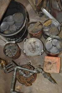 lot 105 image: Large amount of lead puckssticks that are melted down along with melting pot