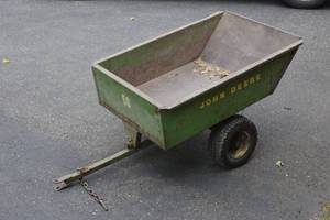 lot 109 image: John Deere tow behind utility dump cart