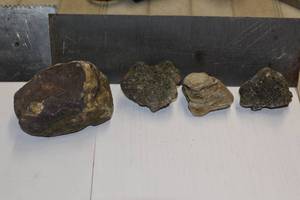 lot 121 image: lot of rocks. the back plate is 4 tall