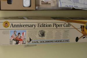 lot 136 image: Carl Goldberg Anniversary Edition Piper Cub RC Airplane Kit selling for 350 on ebay