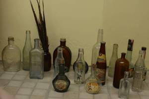 lot 139 image: Misc. bottles some are local from Shakopee and Glencoe
