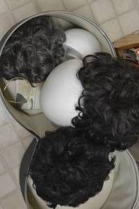 lot 148 image: Black Case with wigs and foam heads