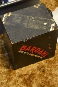 lot 205 image: wood box filled with old hot rod magazines