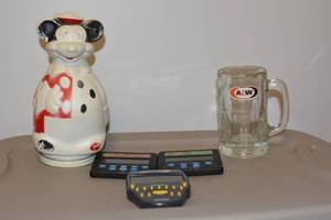 lot 217 image: Mickey Mouse Cereal container, handheld games and A&W mug