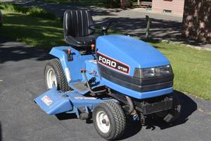 lot 8 image: Ford GT95 Lawn Tractor With multiple attachments and all manuals, serviced yearly. meticulous condition