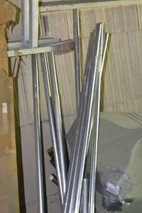 lot 19A image: Aluminum tubes- new bought for making windchimes and a step ladder