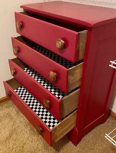 lot 67 image: RedMaroon Wooden 4 Drawer Dresser