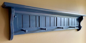 lot 80 image: Pottery Barn Kids Brilliant Blue Wooden Shelf with Pegs