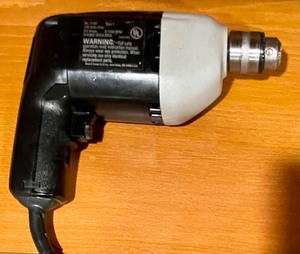 lot 123 image: Black & Decker 38 Drill