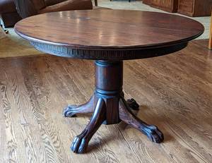 lot 11 image: Claw Foot Round Wood Dining Table