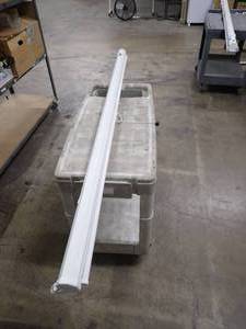 lot 36 image: Projector Screen  No Stand but has loops for hanging  screen is in great shape, no tears or holes75 Inches Long