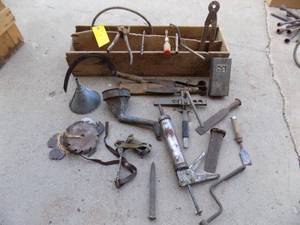 Wooden box with vintage tools