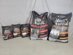 5 New Bags of Whole Hearted Dog Food