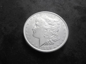 lot 13 image: 1886 Morgan Silver Dollar