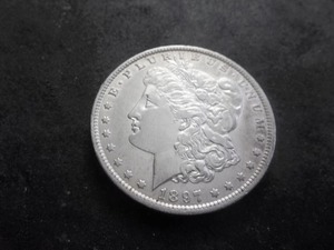 lot 26 image: 1897 O Morgan Silver Dollar