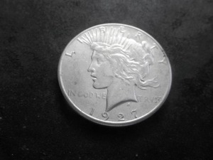 lot 55 image: 1927 S Peace Silver Dollar