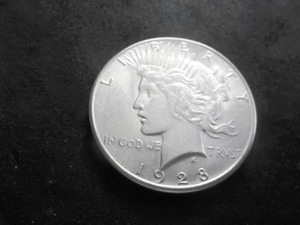 lot 57 image: 1928 S Peace Silver Dollar