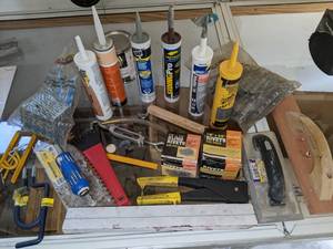 lot 78 image: Misc garage items including caulkin...