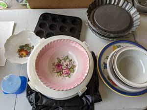 lot 143 image: Pie pans, mini muffin tins, cupboar...