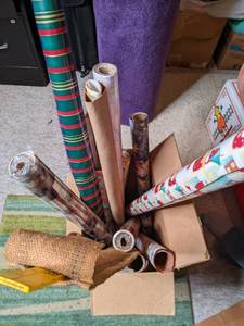 lot 33 image: Box of wrapping paper and yard stic...