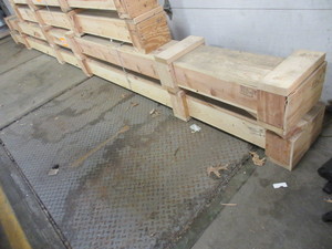 LONG, WOODEN, CUSTOM MADE CRATES STAMPED FOR INTERNATIONAL SHIPPING
