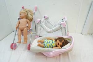 dolls, playpen, stroller, and car seat