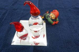 glass snowmen on mirror, and little boy figurine