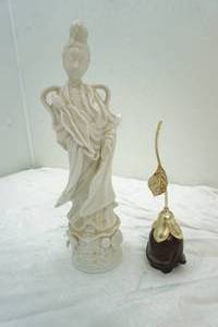 rose and oriental statue