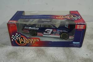 lot 62 image: Winners Circle Dale Earnhardt 124 Scale Die Cast Car