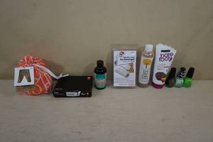 lot 181 image: Foot and Nail Care Items - Nail Polish, Foot Lotion and Soak, SM Shorts, Argan Oil