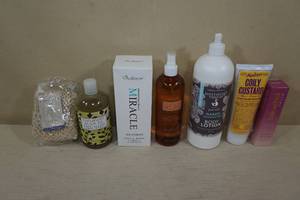 lot 184 image: Self Care Items - Hair Treatment, Mousse, Body Scrubber, Body Wash, Lotion, Retinol