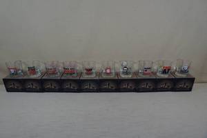 lot 214 image: 10 Novelty Trump Theme Whiskey Glasses