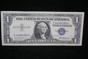 lot 241 image: 1957 $1 Blue Seal Silver Certificate
