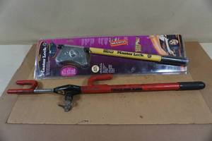 lot 115 image: Automotive Steering Wheel Lock Bars