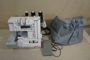 lot 144 image: Vintage Elna Lock Pro 5 DC Serger Sewing Machine